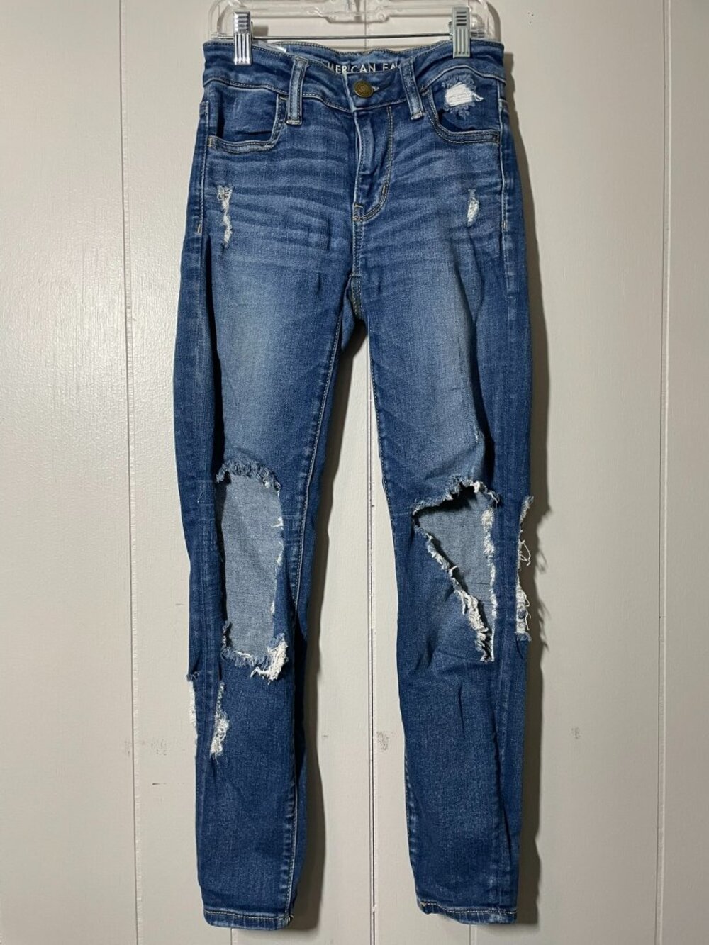 Ripped blue jeans